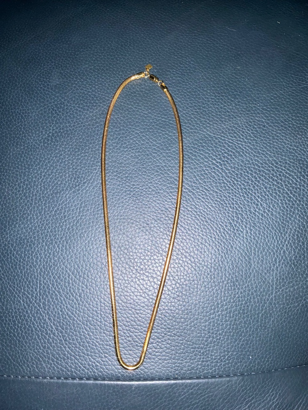 Gold color 18 inch snake chain.
